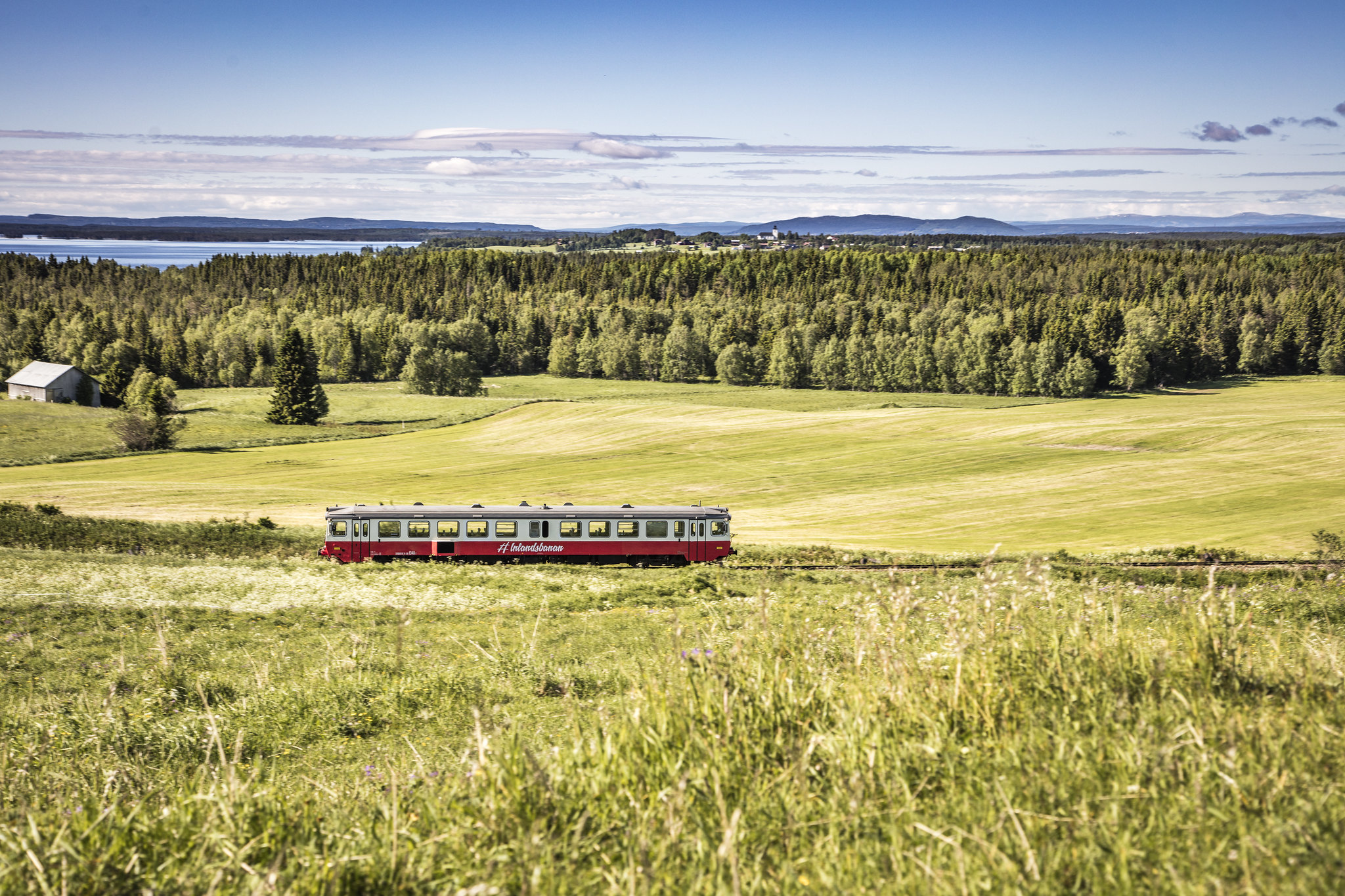 Inlandsbanen Rail Tour | Train in field