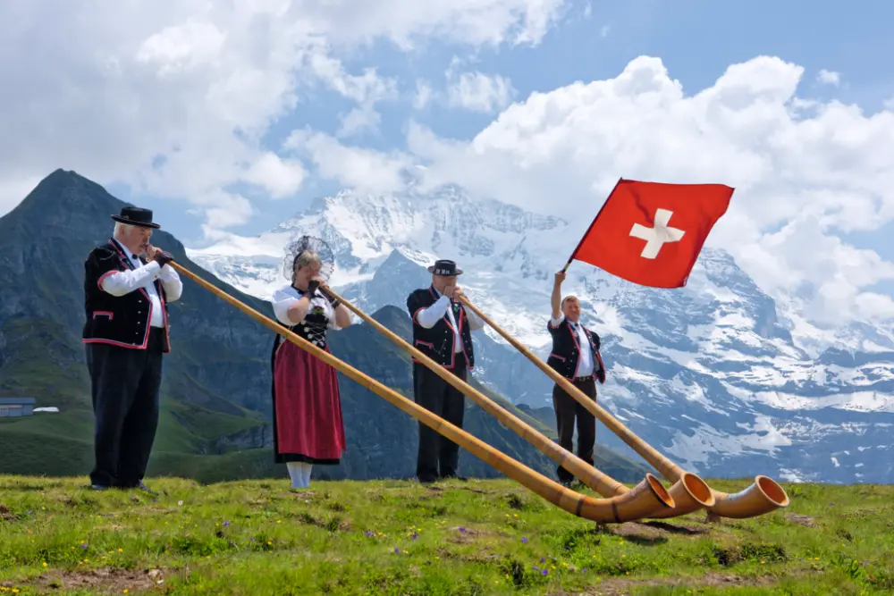 Rondreis Zwitserland Trein | Zwitserse Panorama's | Maennlichen-Alphorn-Flag